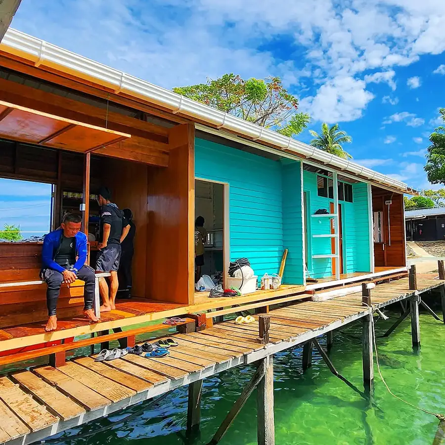 Scenic view of the wooden overwater chalets at the resort Luma Selakan